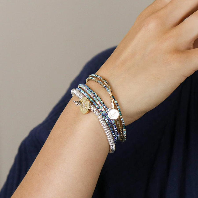 Silver and Faux Gold Blue Mix Crystal Five Bracelet Stack on Model