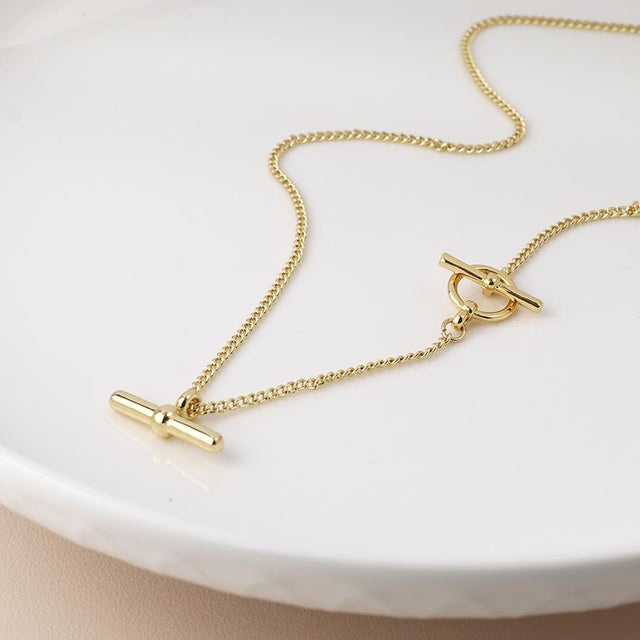 Faux Gold T Bar Pendant on Chain Necklace Close Up