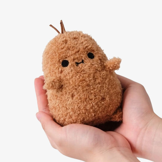 Ricespud Original Mini Sitting Plush Toy Held by Model