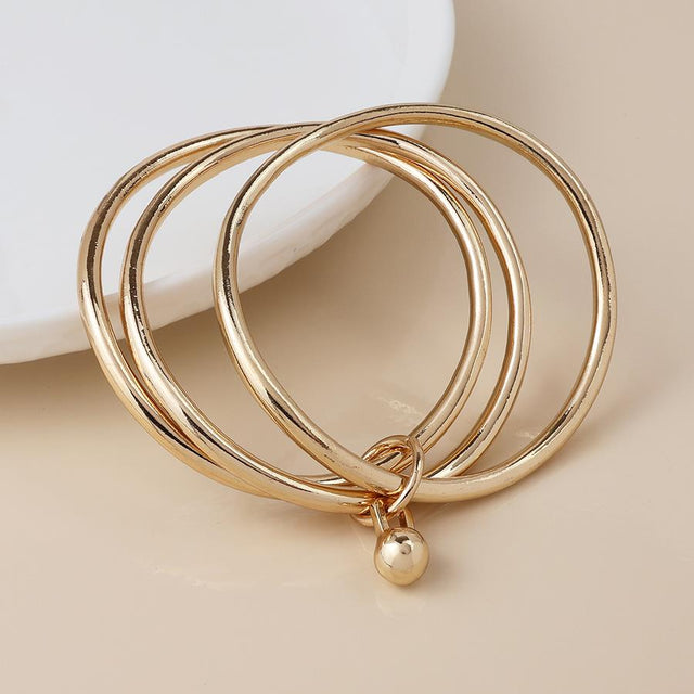 Faux Gold Triple Stacked Bangle with Ball Charm Close Up
