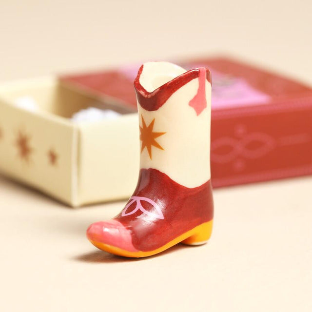 Cowboy Boot Matchbox Ceramic Token Close Up