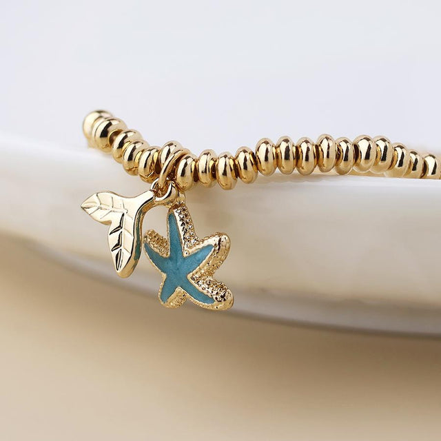 Faux Gold Bead Bracelet with Blue Enamel Starfish Charm Close Up