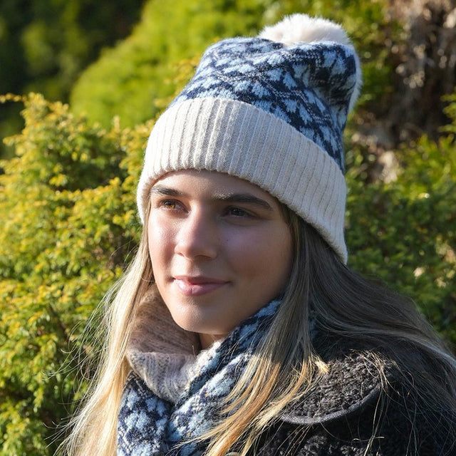 Navy & Cream Mix Flower Hat With Faux Fur Pompom on Model