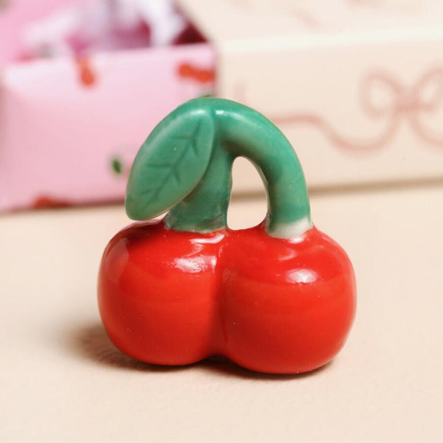 Tiny Matchbox Ceramic Cherry Token Close Up