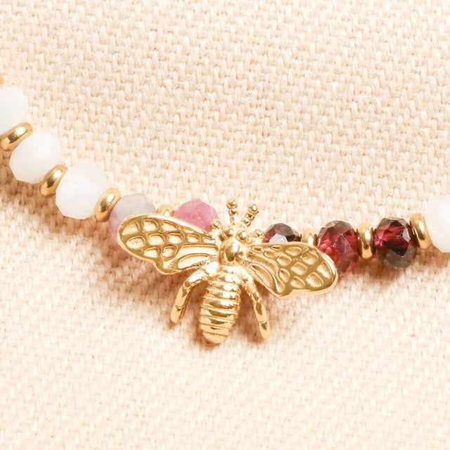 Burgundy Bead Bracelet with Bee Charm in Gold Close Up