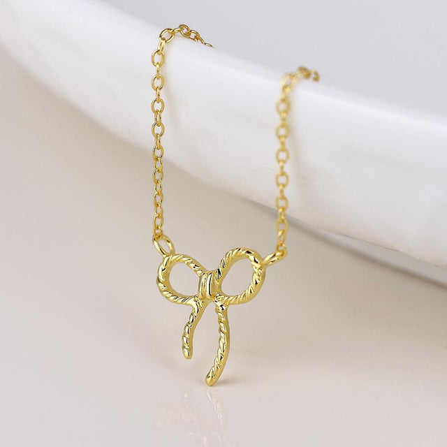 Gold Twist Bow Necklace